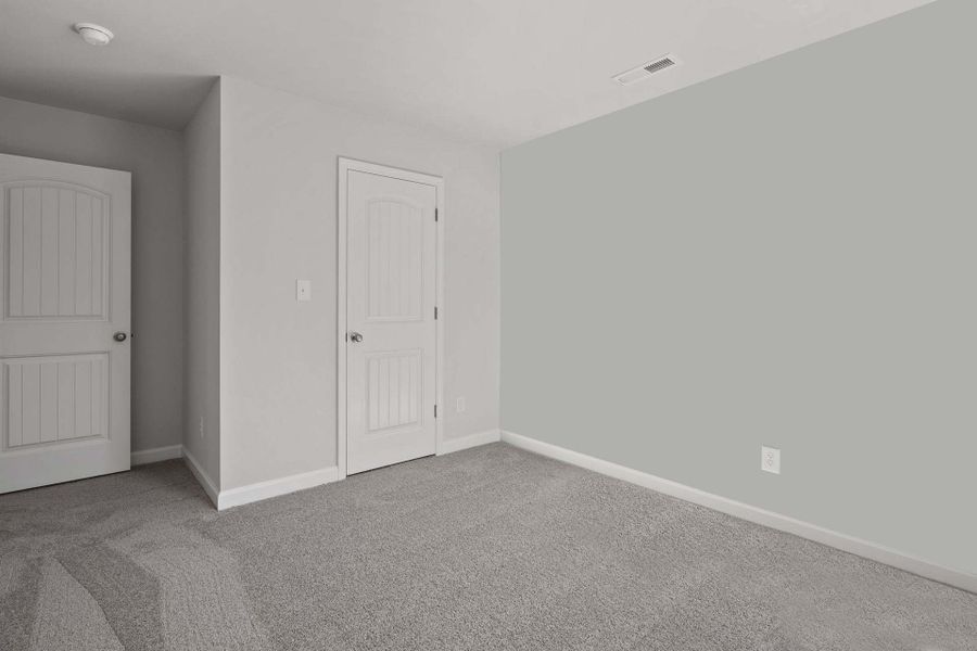 Representative unfurnished interior of a home built from the Camellia by Caviness & Cates Communities in Bartlett Manor, Youngsville (Image 106).