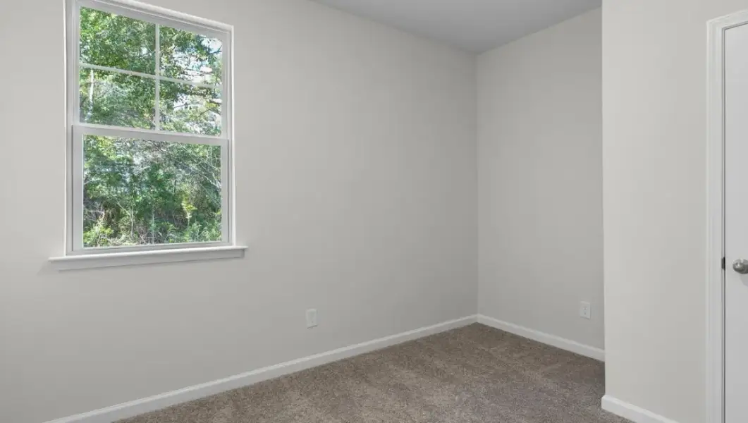 Spacious, unfurnished interior of a new home in The Highlands at Cedar Hill Landing, Navassa (Image 20).