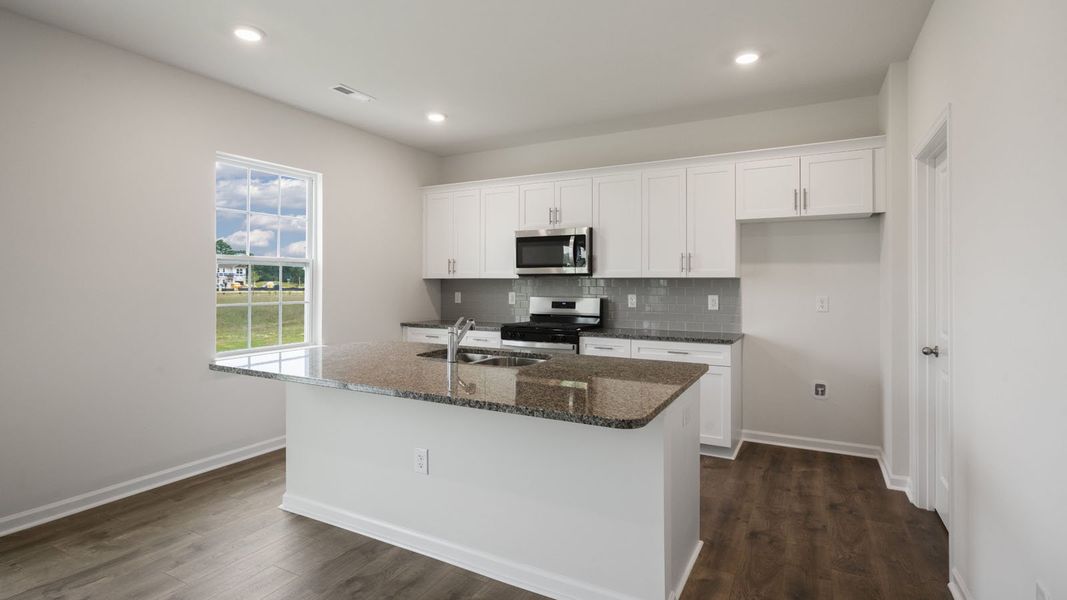 Furnished interior view inside a new home in Ridgewood Farms, Winterville (Image 8). Furnished interior view inside a new home in Ridgewood Farms, Winterville (Image 8).