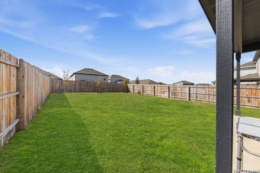 Exterior details and patio area of a home in Cinco Lakes, San Antonio (Image 4).