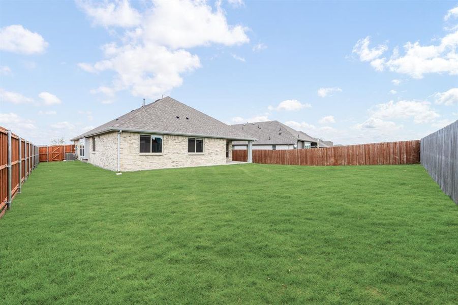 Front exterior of a new home in Heartland Classic 60, Crandall, TX, highlighting curb appeal (Image 2).