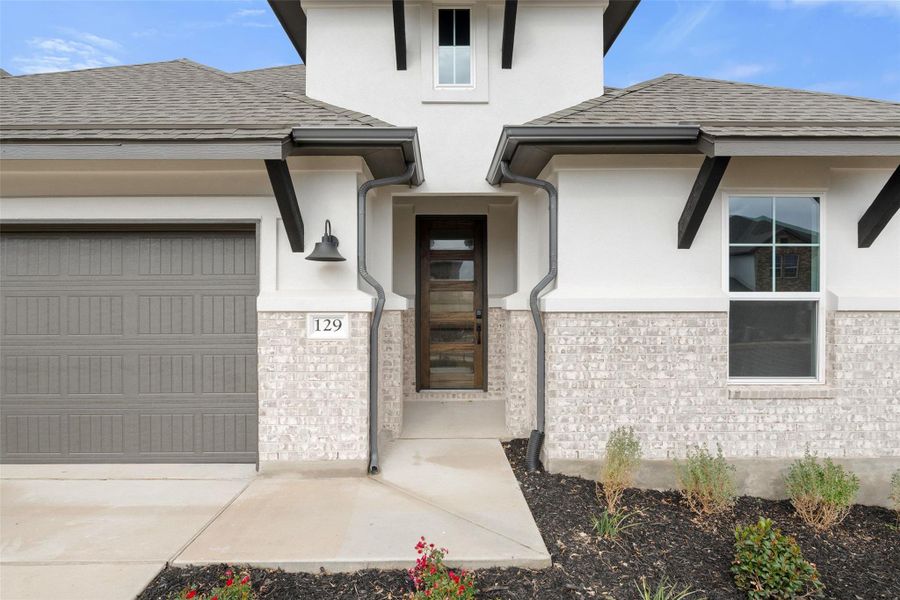 Exterior details and patio area of a home in Lariat, Liberty Hill (Image 26). Exterior details and patio area of a home in Lariat, Liberty Hill (Image 26).