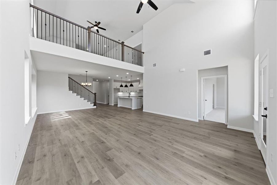 You'll find beautiful wrought iron railings that create a multi level living-entertaining space in this dream home!