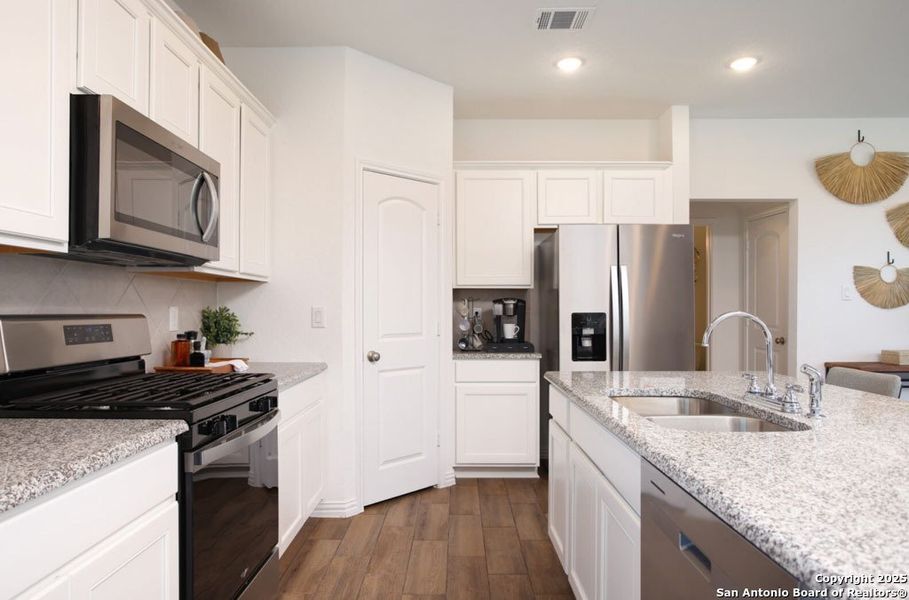 Furnished interior view inside a new home in Morgan Meadows, San Antonio (Image 14).
