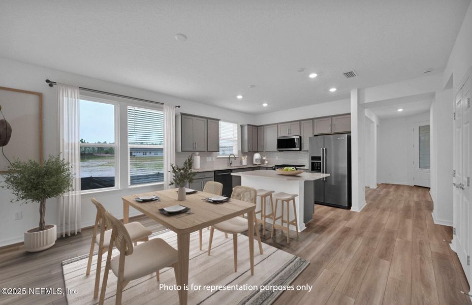 Furnished interior view inside a new home in Del Webb Wildlight, Yulee (Image 4).