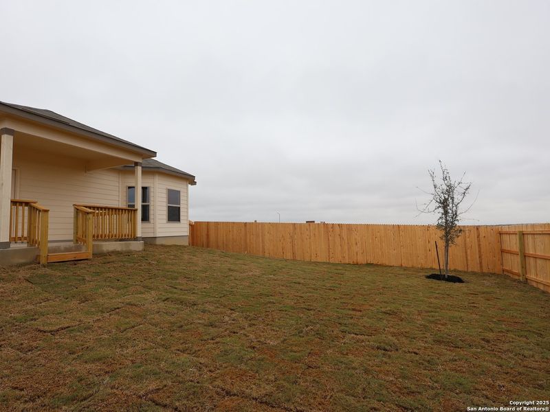 Exterior details and patio area of a home in Paloma Park, Converse (Image 24).