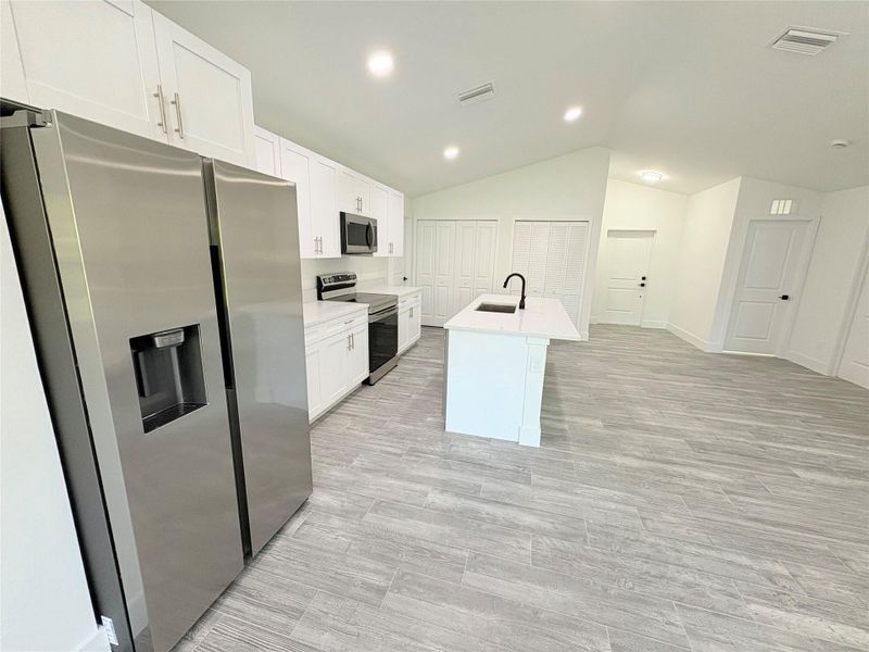 Furnished interior view inside a new home in , Okeechobee (Image 11).
