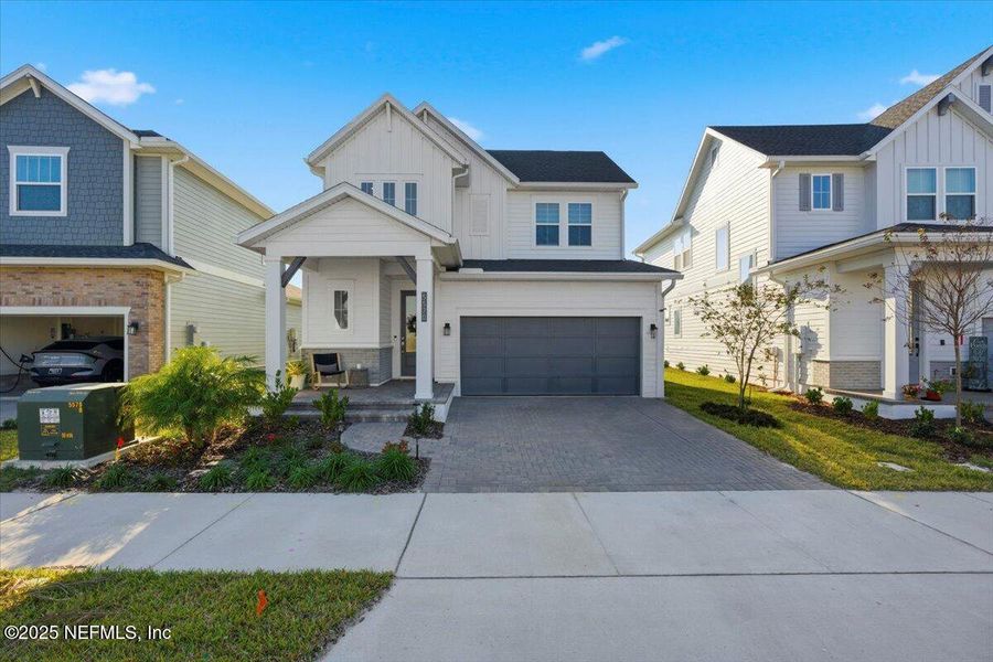Front exterior of a new home in , Jacksonville, FL, highlighting curb appeal (Image 27).