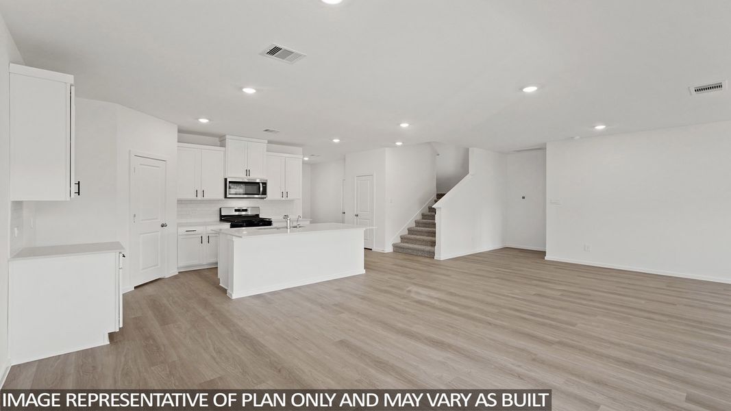 Furnished interior view inside a new home in New Waverly Station, New Waverly (Image 5). Furnished interior view inside a new home in New Waverly Station, New Waverly (Image 5).