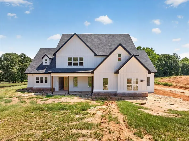 Exterior details and patio area of a home in , Loganville (Image 4).