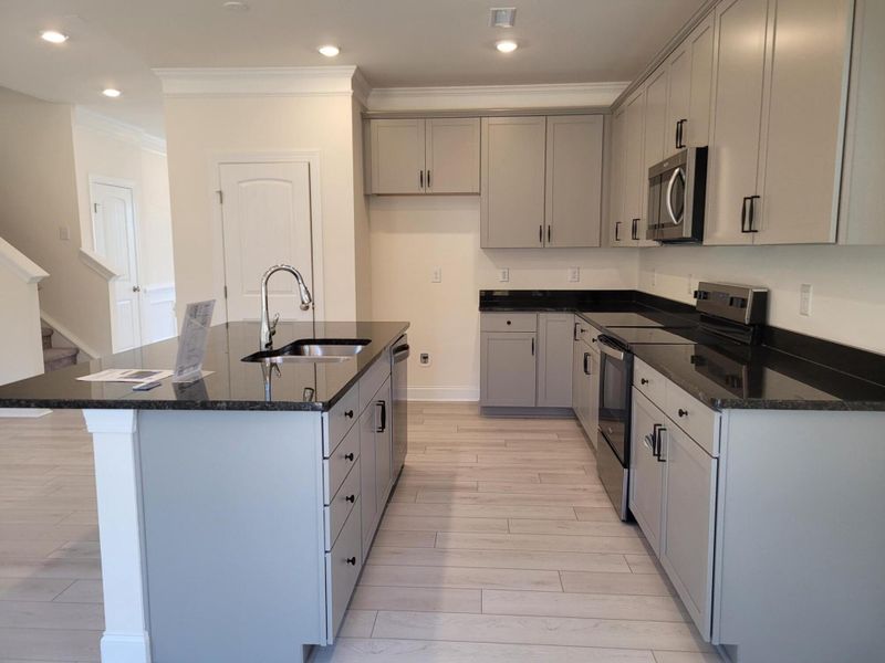 Furnished interior view inside a new home in 1158 Place, Wilson (Image 4).