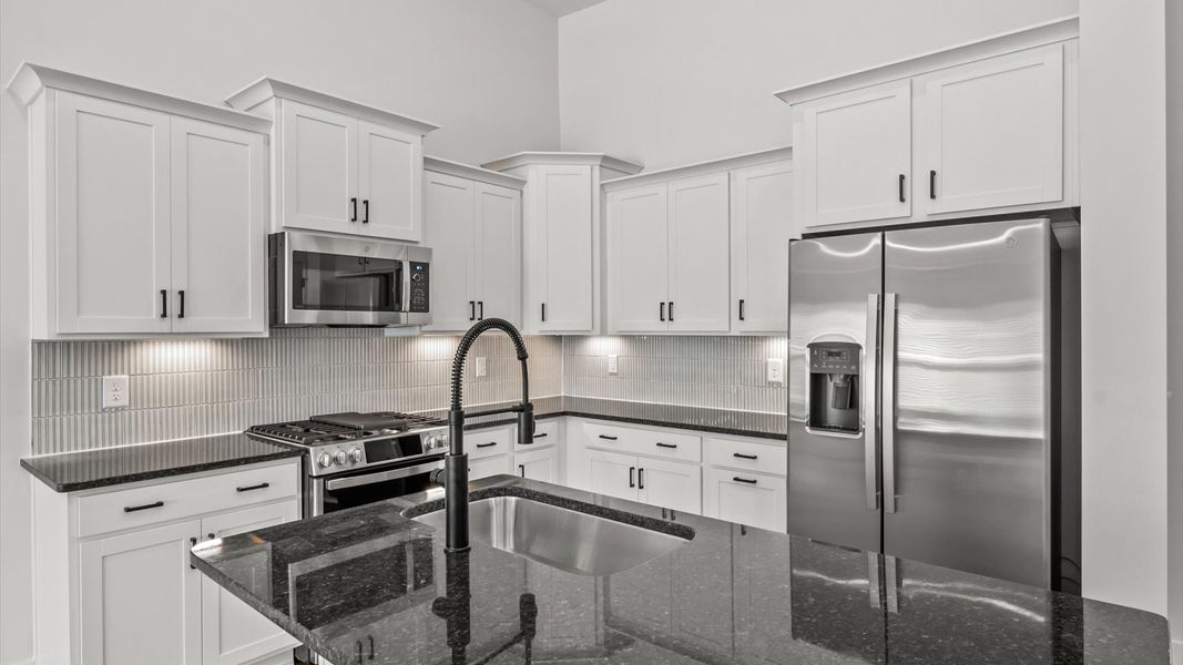 Accomplished design in a kitchen that blends function and form with a right-sized island