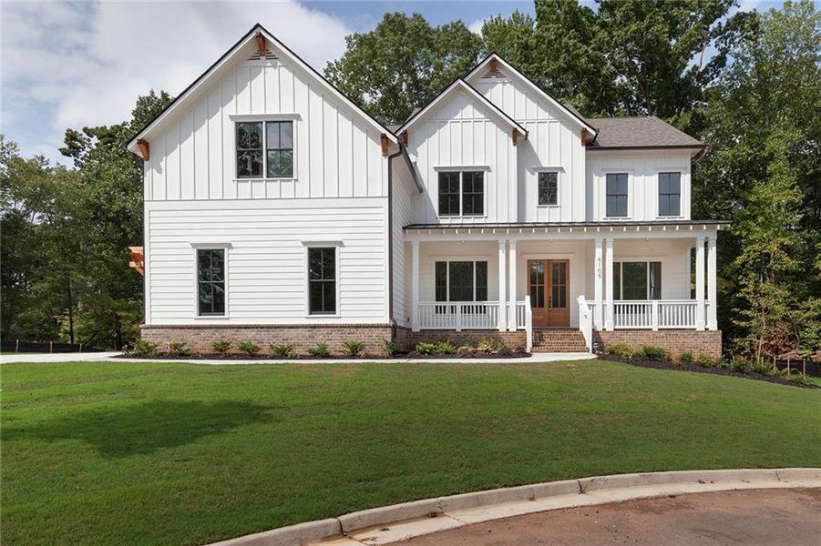 Front exterior of a new home in , Marietta, GA, highlighting curb appeal (Image 1). Front exterior of a new home in , Marietta, GA, highlighting curb appeal (Image 1).