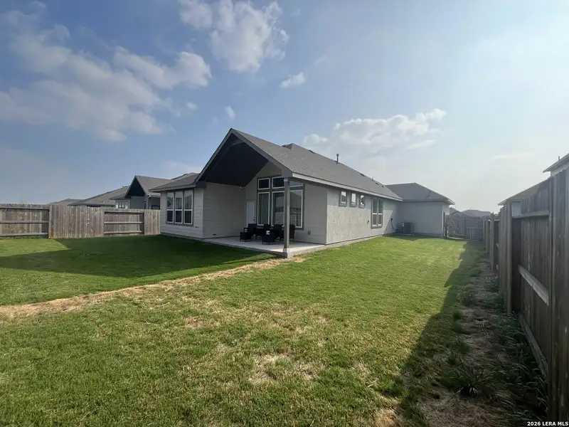 Exterior details and patio area of a home in , Seguin (Image 3).