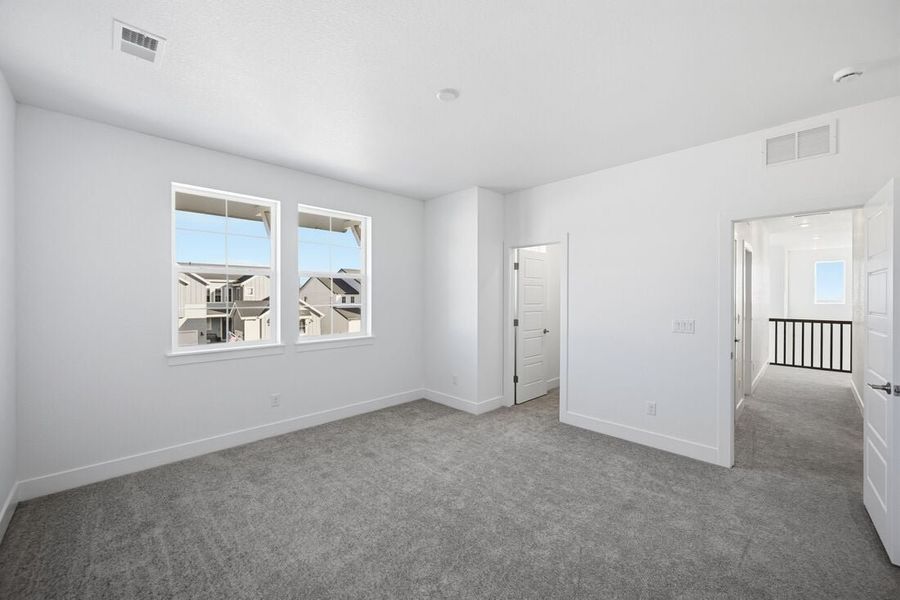 Spacious, unfurnished interior of a new home in Trailstone, Arvada (Image 36).