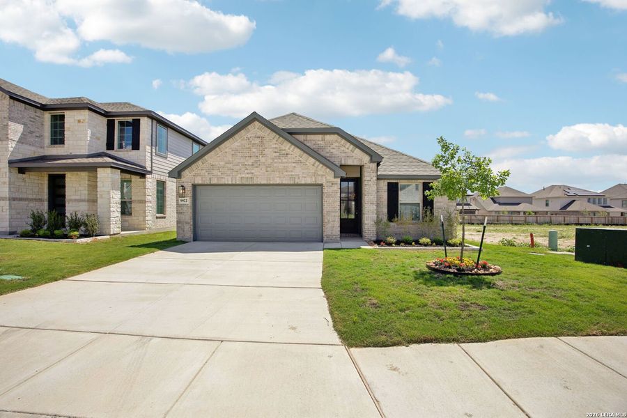Front exterior of a new home in Kallison Ranch, San Antonio, TX, highlighting curb appeal (Image 19).