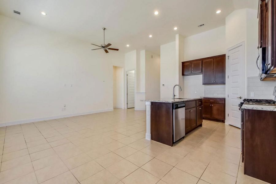 Representative furnished interior of a home built from the Oaks 1596 by Brohn Homes in Oaks at San Gabriel, Georgetown (Image 8).