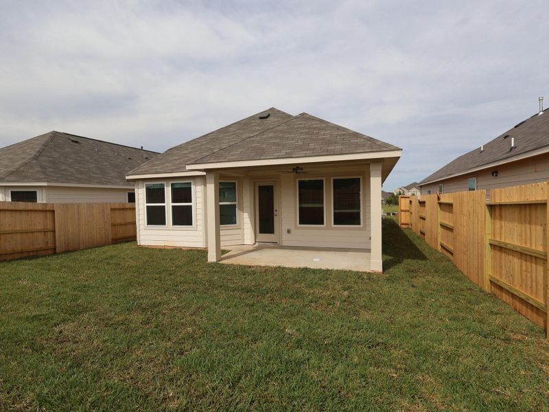 Exterior details and patio area of a home in Lone Star Landing, Montgomery (Image 19).