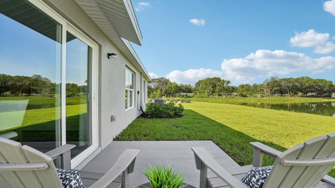 Exterior details and patio area of a home in Oakfield Lakes, Parrish (Image 2). Exterior details and patio area of a home in Oakfield Lakes, Parrish (Image 2).