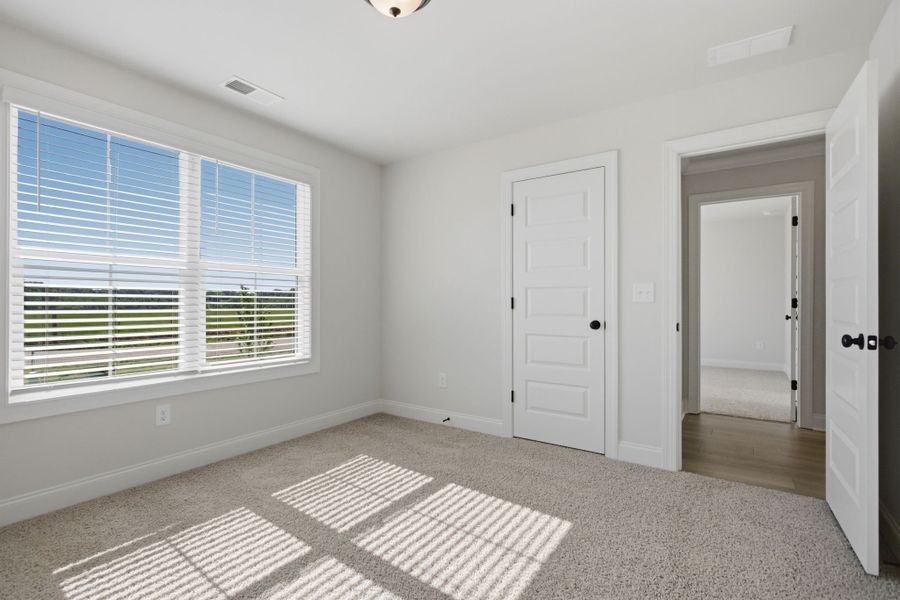 Spacious, unfurnished interior of a new home in Cherokee Knoll, Williamston (Image 34).