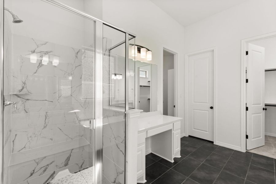 Walk-in Shower with bench seating in Primary Bath