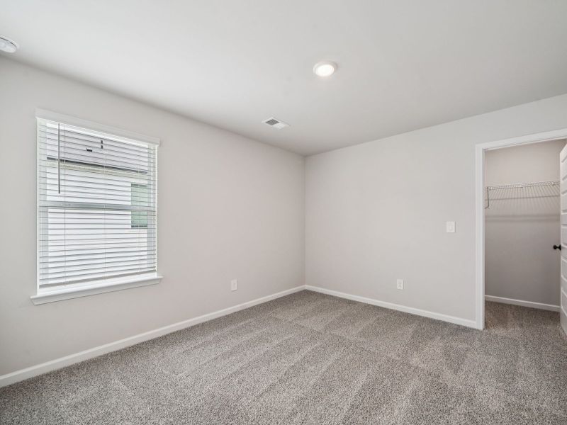 Spacious, unfurnished interior of a new home in Vines at Mill Creek - Estate Series, Braselton (Image 18).