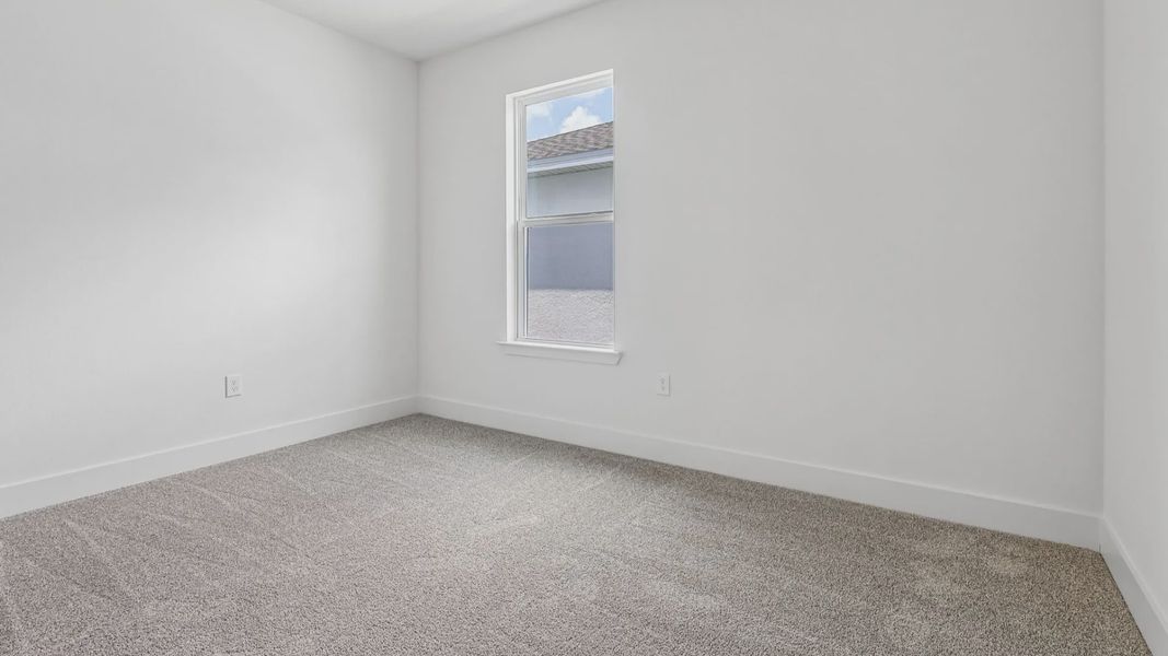 Furnished interior view inside a new home in Ardisia Park, New Smyrna Beach (Image 23).