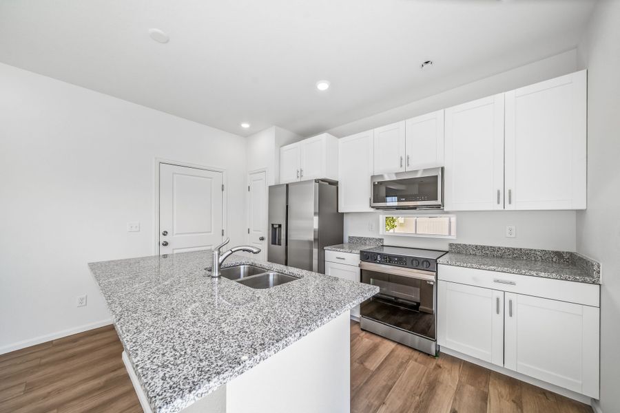 Furnished interior view inside a new home in Reunion, Commerce City (Image 5).