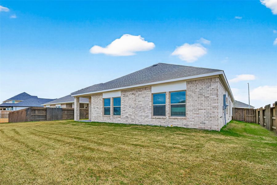 Exterior details and patio area of a home in Arabella on the Prairie, Richmond (Image 27).