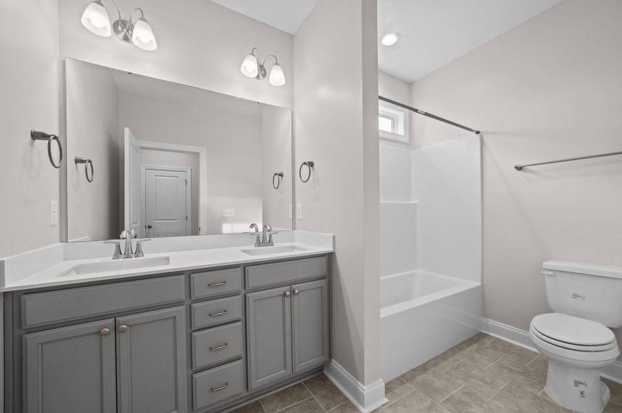 Furnished interior view inside a new home in The Preserve at Langston, Winterville (Image 15). Furnished interior view inside a new home in The Preserve at Langston, Winterville (Image 15).