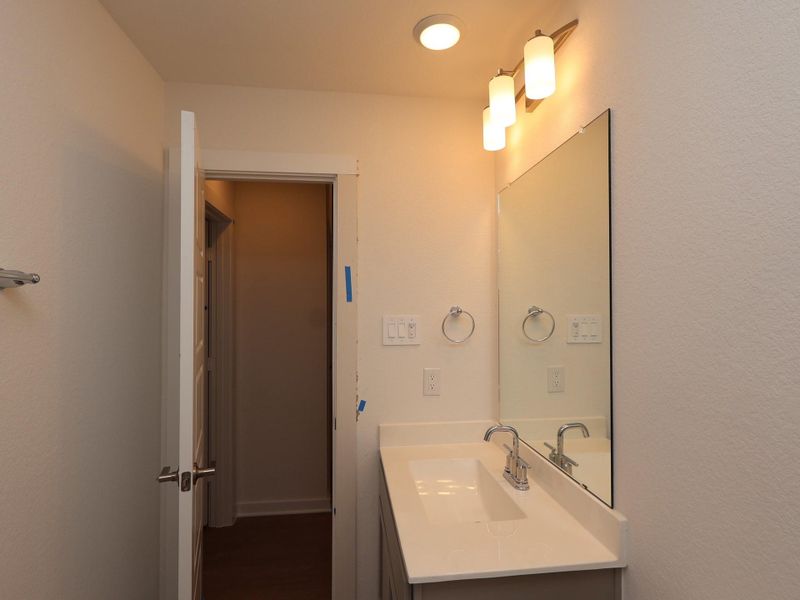 Furnished interior view inside a new home in Sorella, Tomball (Image 8).