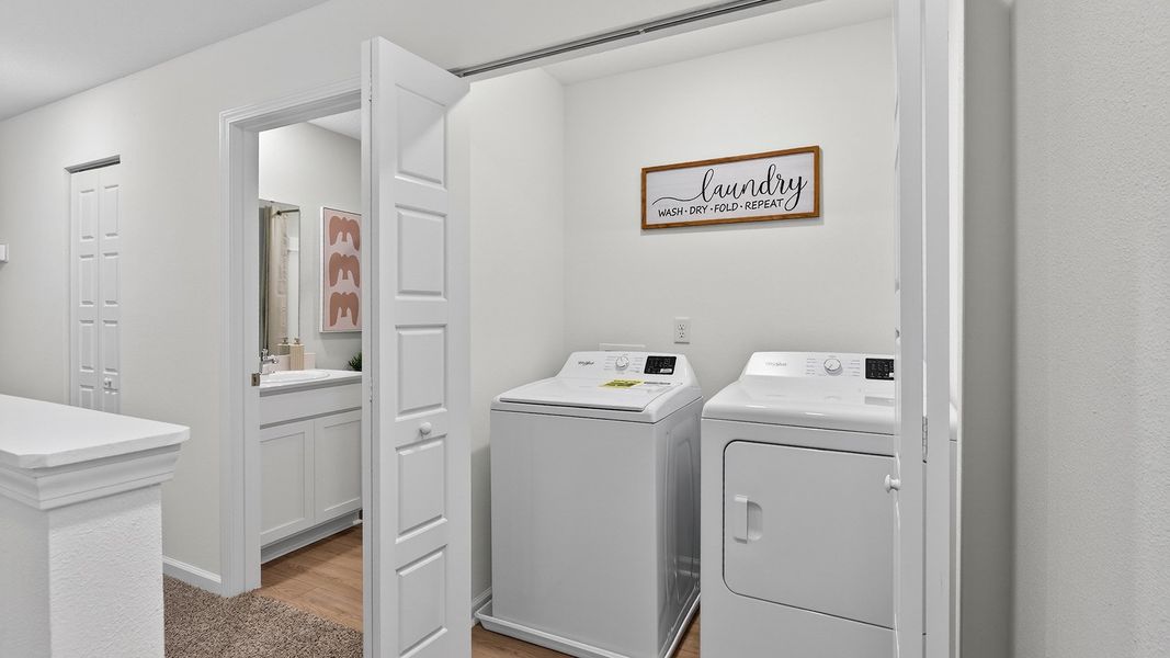 Representative furnished interior of a home built from the Carson by D.R. Horton in Hansen Creek, Jacksonville (Image 23).