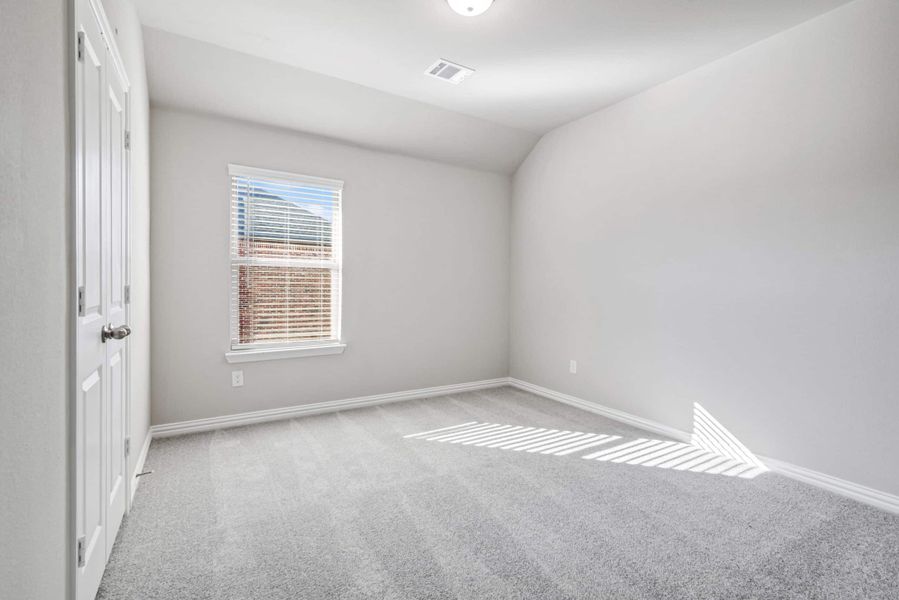 Representative unfurnished interior of a home built from the The Tulip by Lillian Custom Homes in The Preserve, Sherman (Image 13).