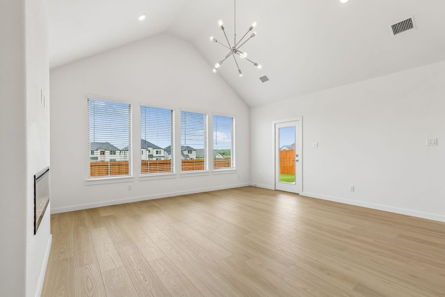 Living Room in the Claret home plan by Trophy Signature Homes – REPRESENTATIVE PHOTO