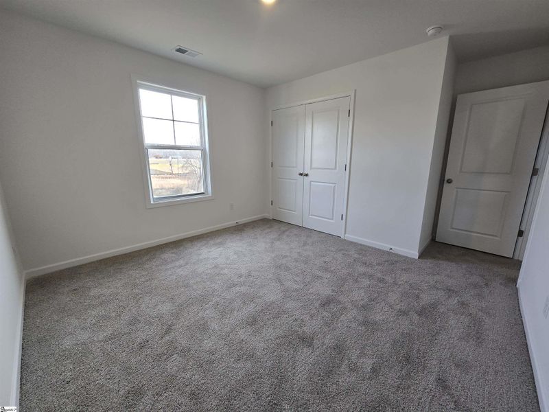 Spacious, unfurnished interior of a new home in Halton Oaks, Spartanburg (Image 28).