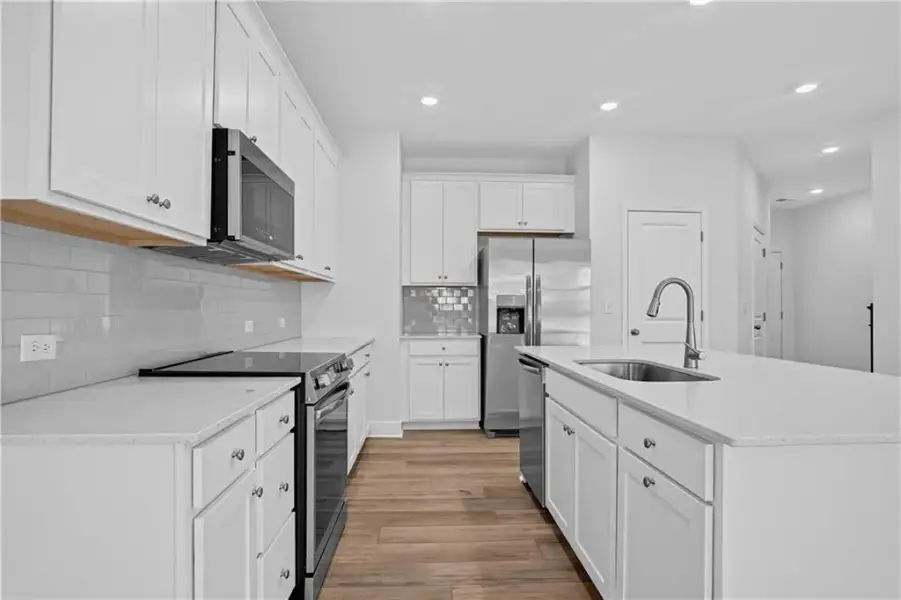 Furnished interior view inside a new home in Towns at Holly Springs, Holly Springs (Image 6).