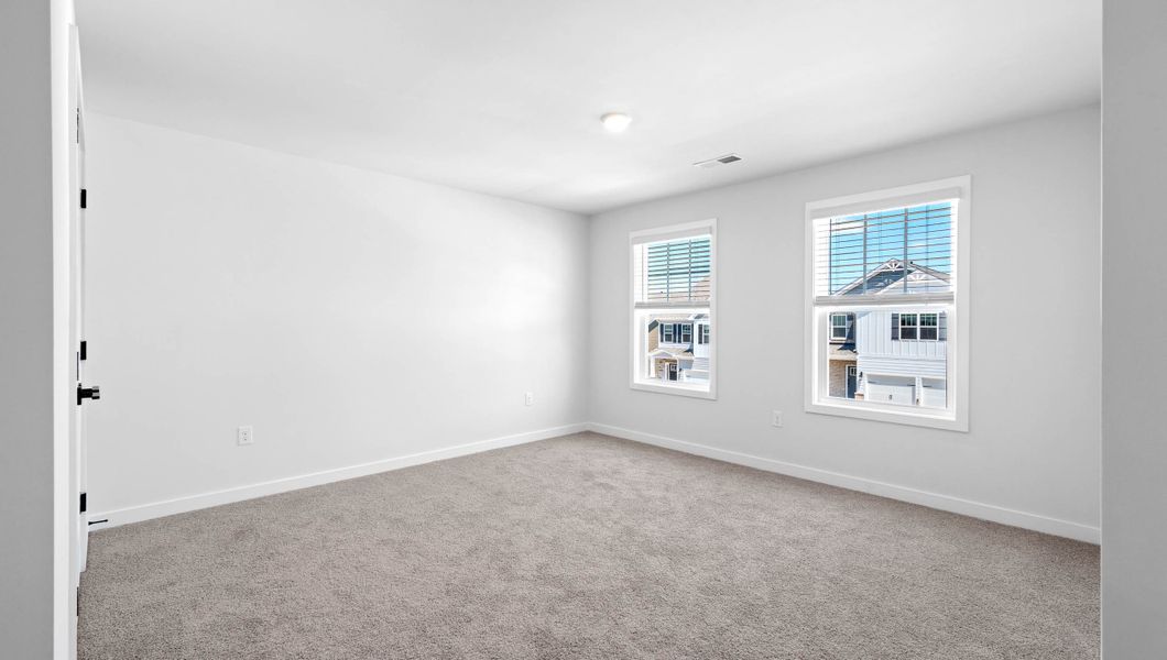 Spacious, unfurnished interior of a new home in Adams Glen, Greenville (Image 27).