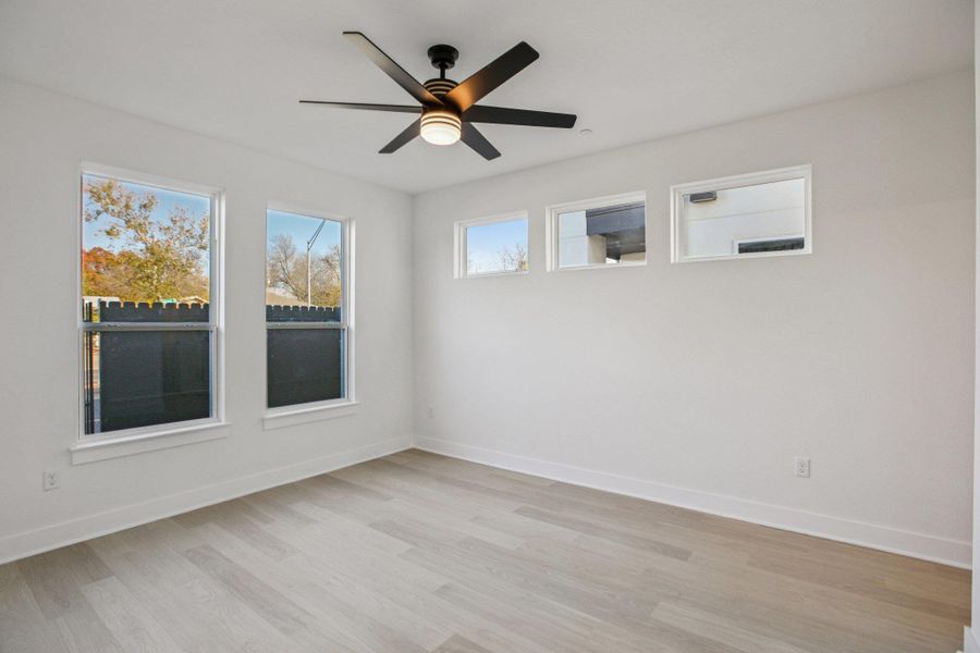 Spacious, unfurnished interior of a new home in Koenig Townhomes, Austin (Image 17).