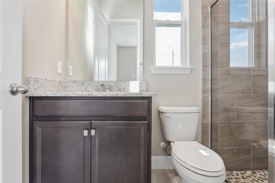 Furnished interior view inside a new home in Laureate Park, Orlando (Image 16).