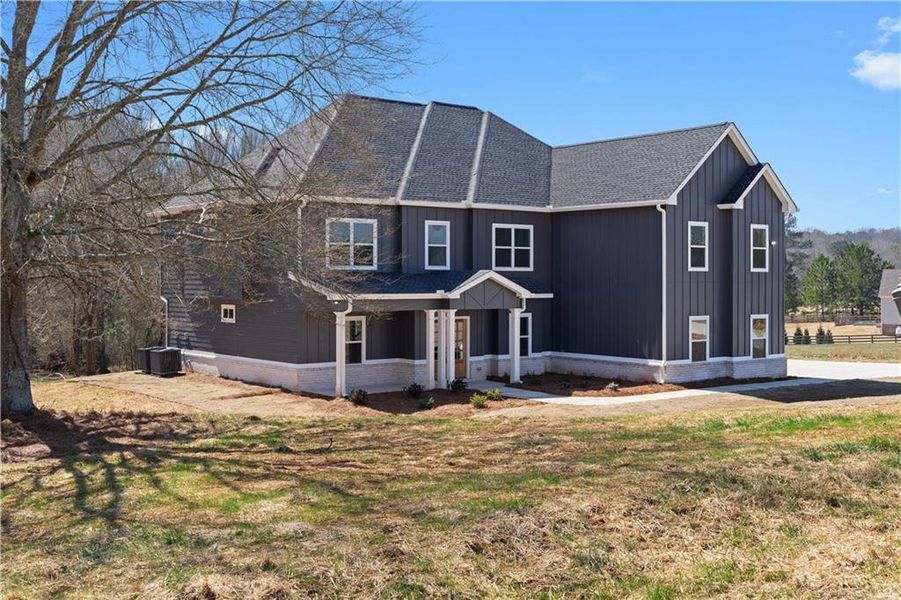 Front exterior of a new home in , Social Circle, GA, highlighting curb appeal (Image 30).