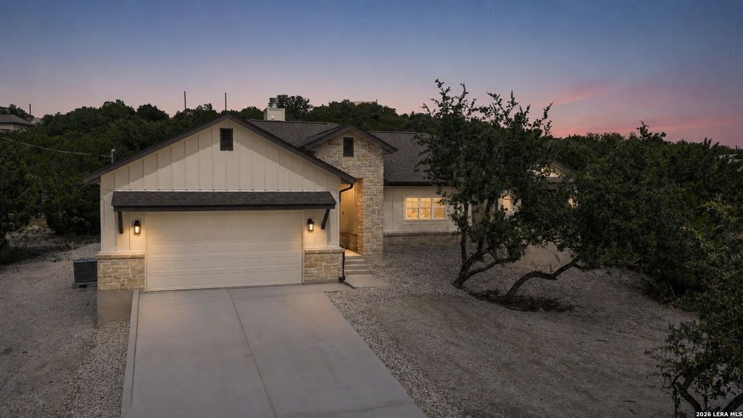 Front exterior of a new home in , Canyon Lake, TX, highlighting curb appeal (Image 1). Front exterior of a new home in , Canyon Lake, TX, highlighting curb appeal (Image 1).