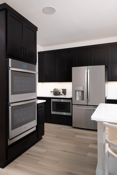 Representative furnished interior of a home built from the Victoria by Tri Pointe Homes in Painted Tree, McKinney (Image 17).