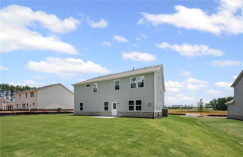 Front exterior of a new home in Anderson Point Estates, McDonough, GA, highlighting curb appeal (Image 2).