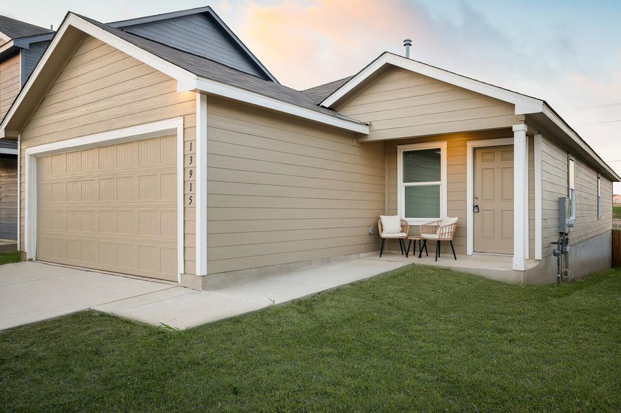 View of front facade featuring a garage, concrete driveway, a front lawn, and a shingled roof View of front facade featuring a garage, concrete driveway, a front lawn, and a shingled roof