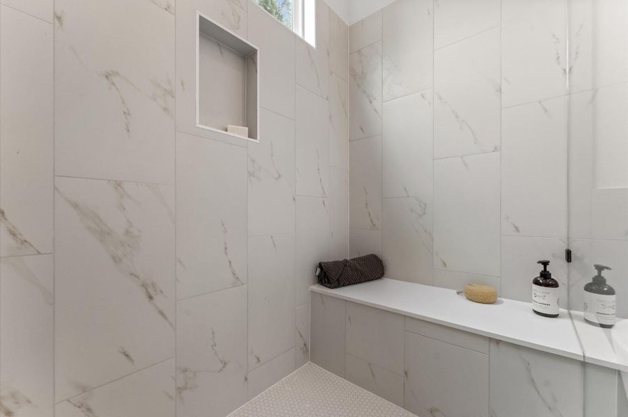 Elegant and serene primary bathroom designed to offer both style and functionality. The space features a luxurious soaking tub ideal for unwinding, a separate glass-enclosed shower for quick refreshes, and a sleek double vanity with ample countertop space and storage—perfect for busy mornings or relaxing evenings. Elegant and serene primary bathroom designed to offer both style and functionality. The space features a luxurious soaking tub ideal for unwinding, a separate glass-enclosed shower for quick refreshes, and a sleek double vanity with ample countertop space and storage—perfect for busy mornings or relaxing evenings.