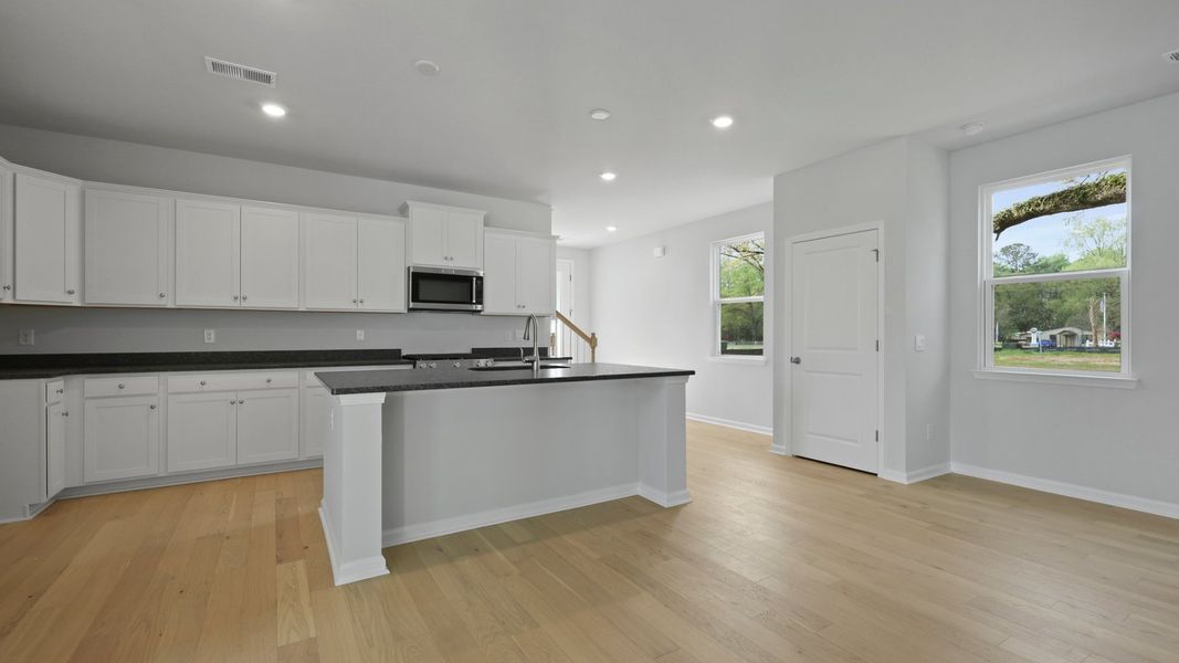 Representative furnished interior of a home built from the RUBY by D.R. Horton in Founders Corner, Summerville (Image 6).