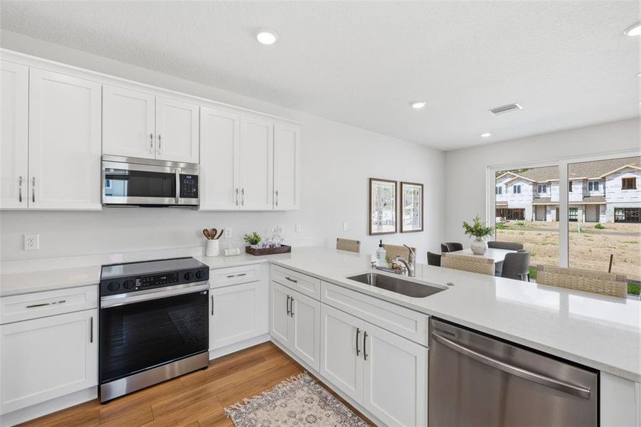 Furnished interior view inside a new home in River Oaks Townhomes, Riverview (Image 12).