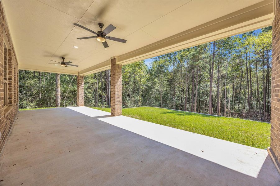 Exterior details and patio area of a home in , New Waverly (Image 26). Exterior details and patio area of a home in , New Waverly (Image 26).