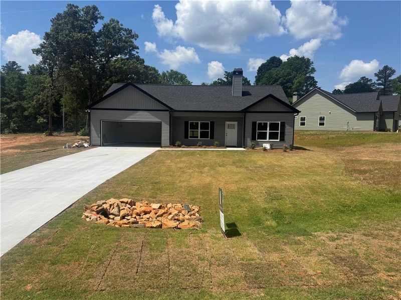Front exterior of a new home in , Lavonia, GA, highlighting curb appeal (Image 1). Front exterior of a new home in , Lavonia, GA, highlighting curb appeal (Image 1).