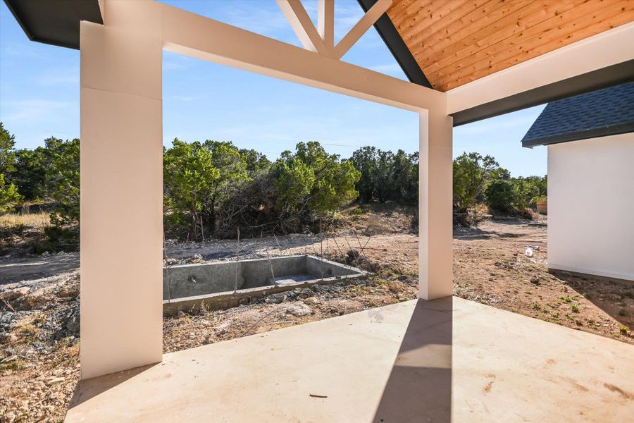 View of patio / terrace featuring view of scattered trees